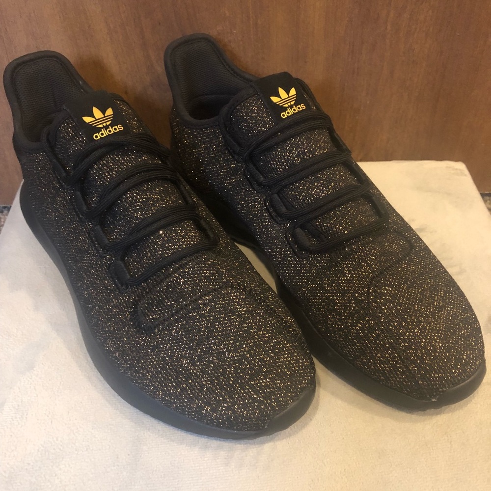 Black and Gold Adidas Ortholite. Women’s size 7